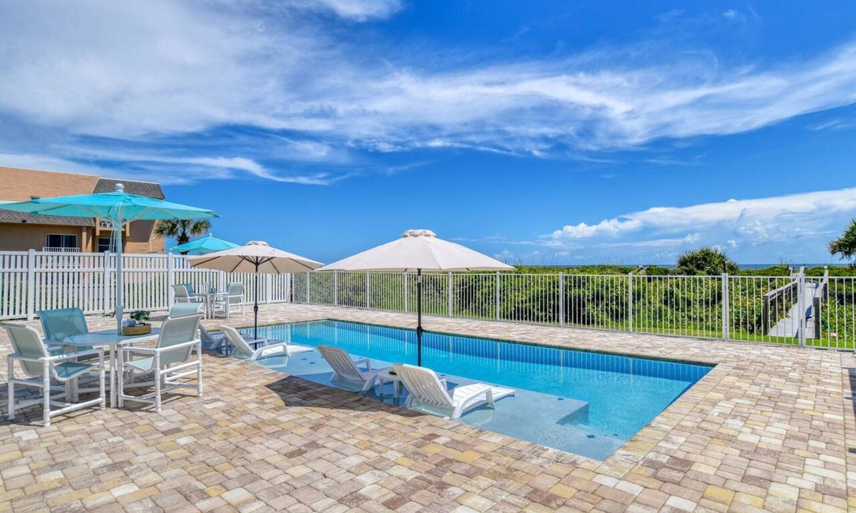 Butler Beach Apartment | BEACHFRONT NEW Heated POOL, Oceanfront Porch and View from Entire Living Space! Private Beach Access