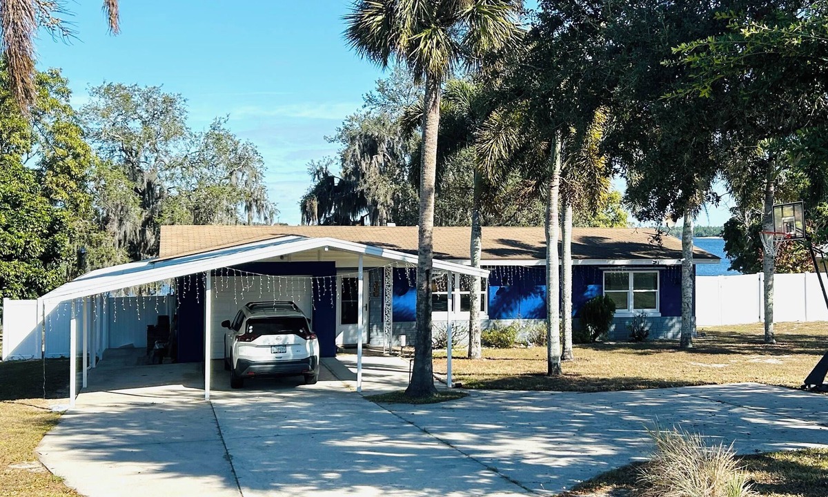 Sebring House | Beautiful Lakefront house w/private dock, powered boathouse, Hottub and Gameroom