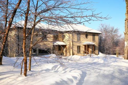 Morin Heights Ski Chalet | Blue Hill Pool spa game room mountain view