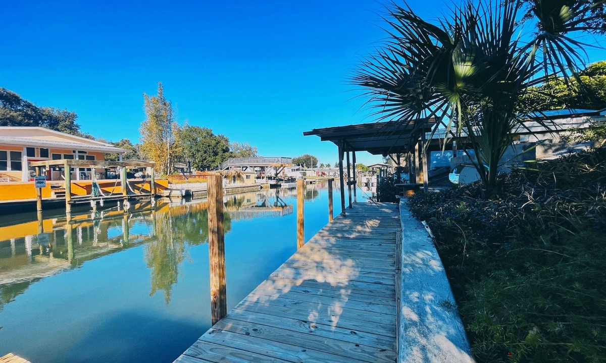 Indian Harbor Estates House | Canal Front Escape with Boat Dock!