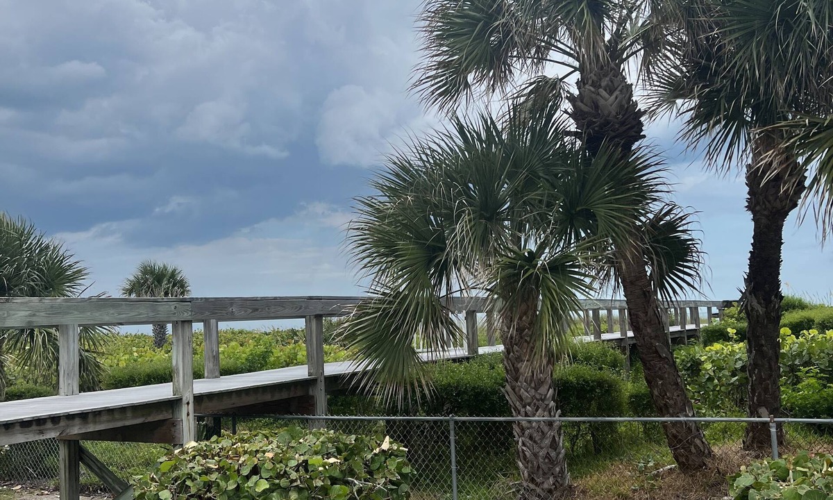 Chandler Park Condo | Cape Canaveral Oceanside Oasis - 1st floor with bikes and beach toys
