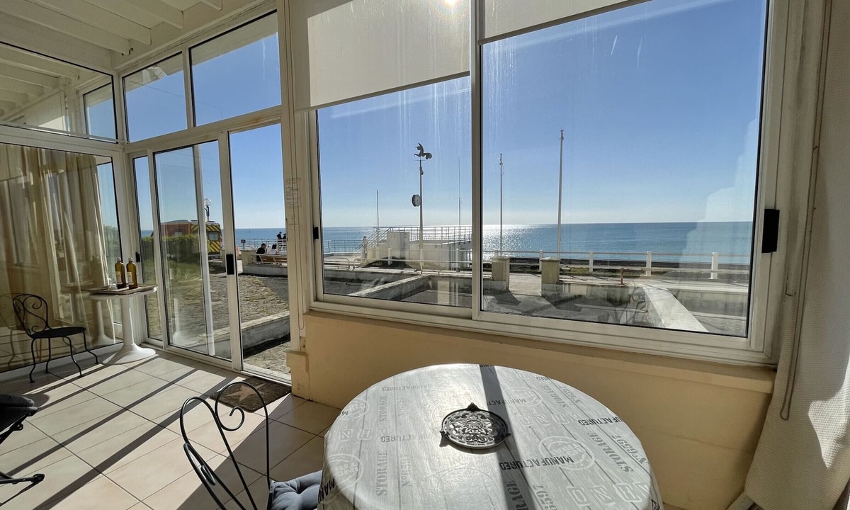 Jullouville Apartment | Charming beachfront duplex with veranda