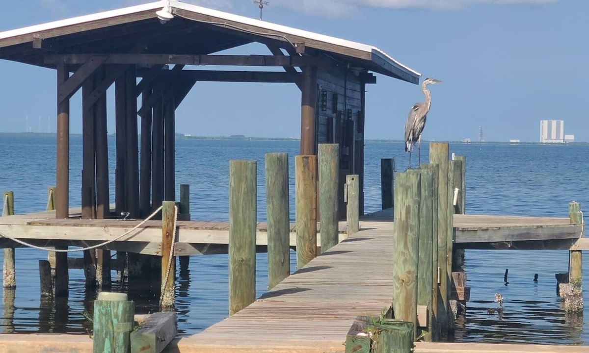 Indian River Residence House | Cozy Getaway with a Dock Facing Rocket Launch Facilities Across the Indian River