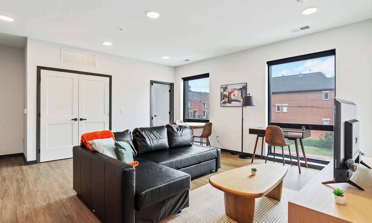 Lockerbie Square Apartment | CozySuites Mass with lounge and roof deck #9