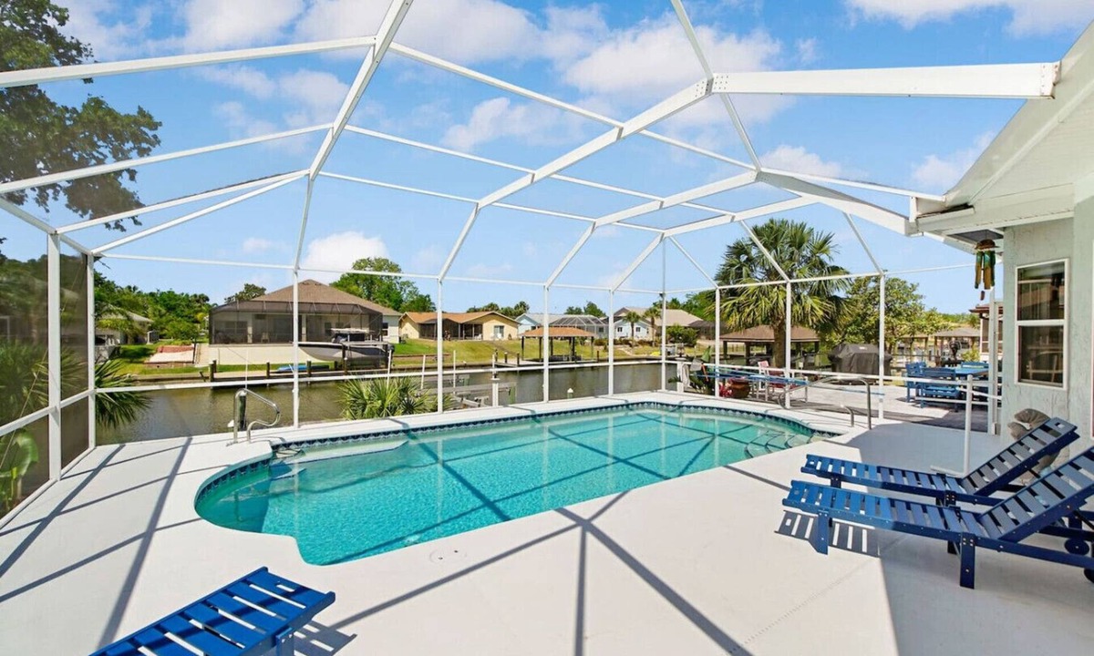 Palm Harbor House | Dockside Dreams - Summer Pool and Canal Retreat!