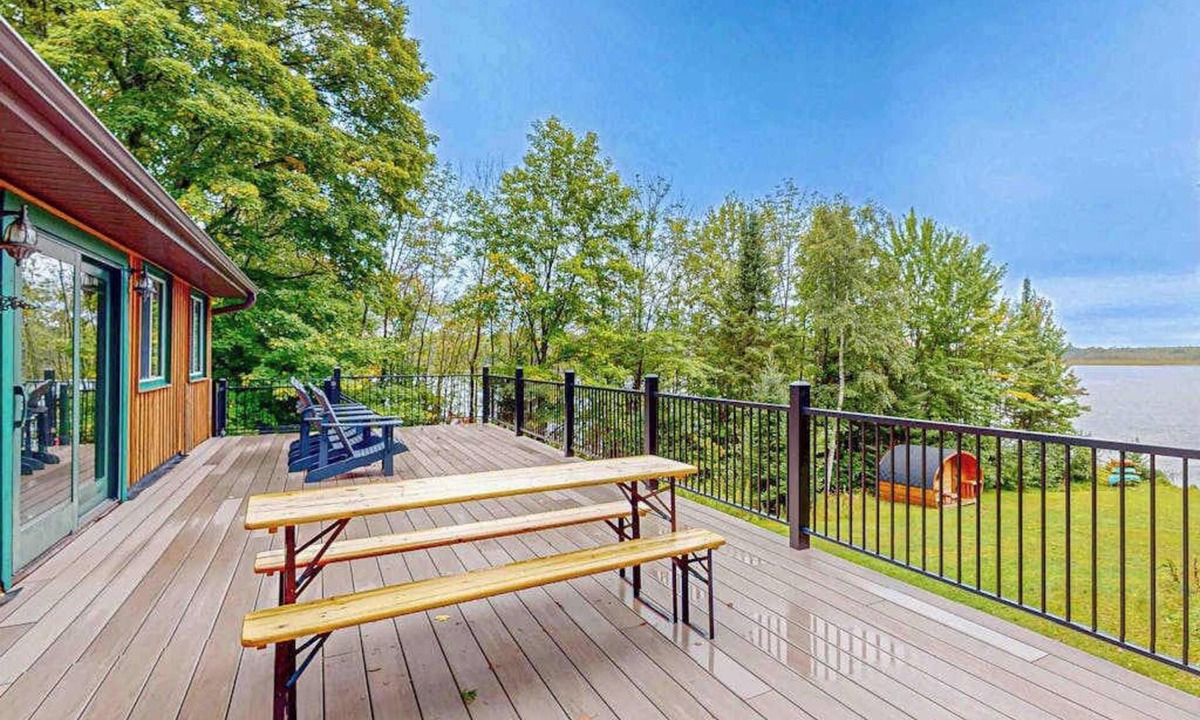 Presque Isle House | Dog-friendly lakefront home with boat access, deck, fireplace, gas grill, kayaks