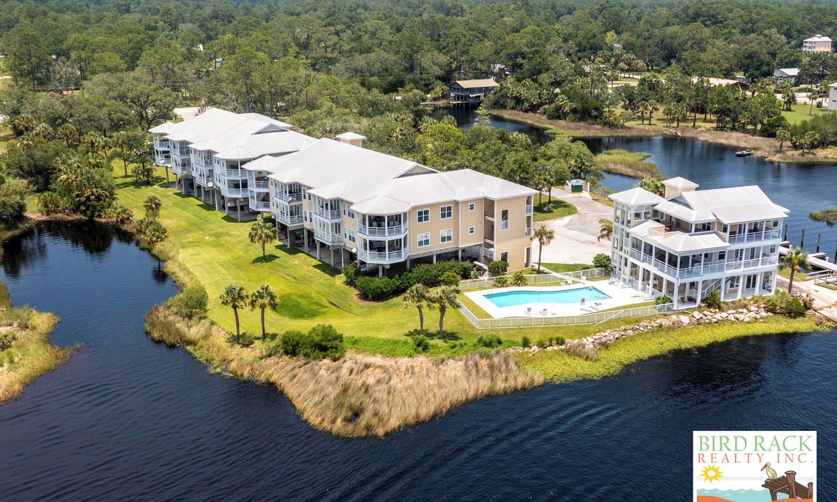 Steinhatchee Condo | Gulf Breeze #103- Private boat ramp & slip! Balcony overlooking the gulf! WiFi!