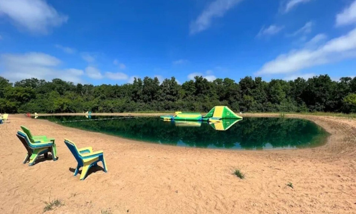 Oshkosh RV Rental | Hidden Haven Camper Beach, Pond, Firepit