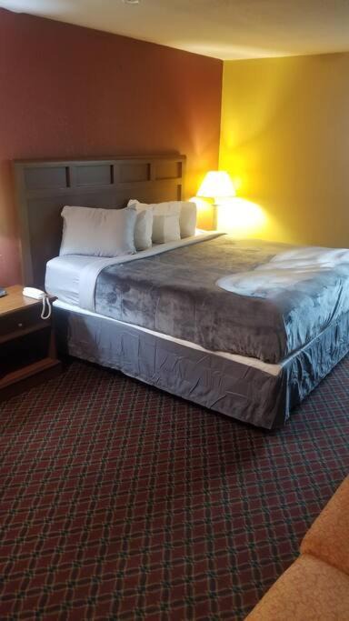 Stillwater Apartment | Hotel OSU King Bed Hotel Room 240 Sateen Sheets Wi-Fi