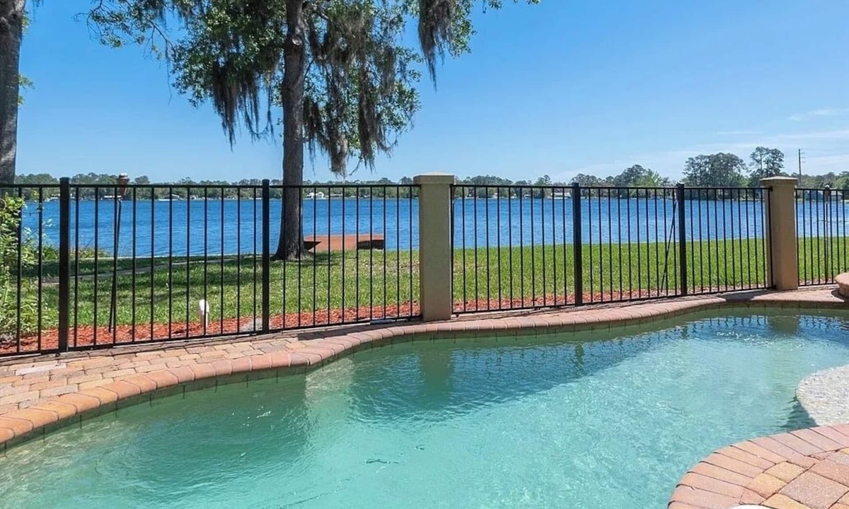 Interlachen House | Lakeside Retreat~ Large home with pool, dock, game room and balcony on lakefront