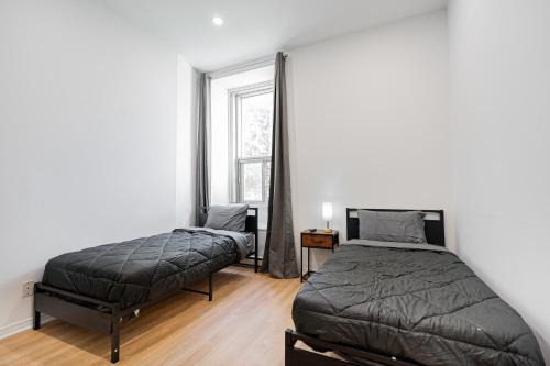 Montreal Apartment | Loft Studio & 2 Single Beds For 2 Guests with Parking