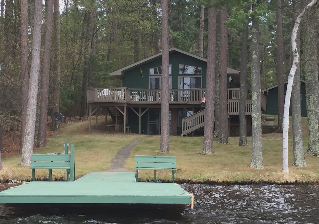 Eagle River House | Lovely Open-Concept Home on Catfish Lake w/Guest Cottage