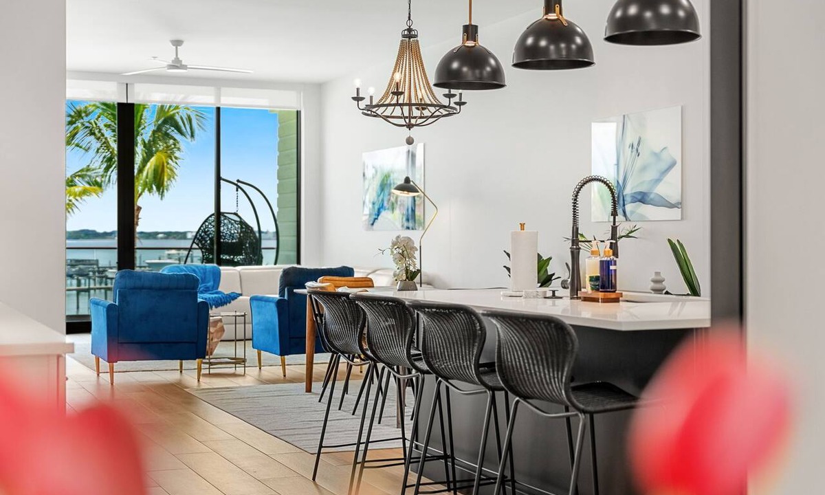 Melbourne Beach Condo | Melbourne Riverfront condo by the beach, pool, hot tub, dock, washer/dryer