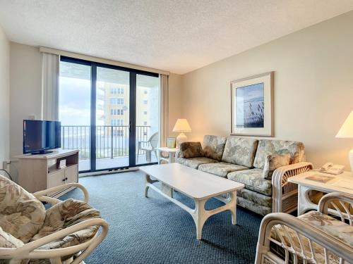 New Smyrna Beach Apartment | Ocean View with a beachfront pool at Ocean Trillium Condo ~ 203