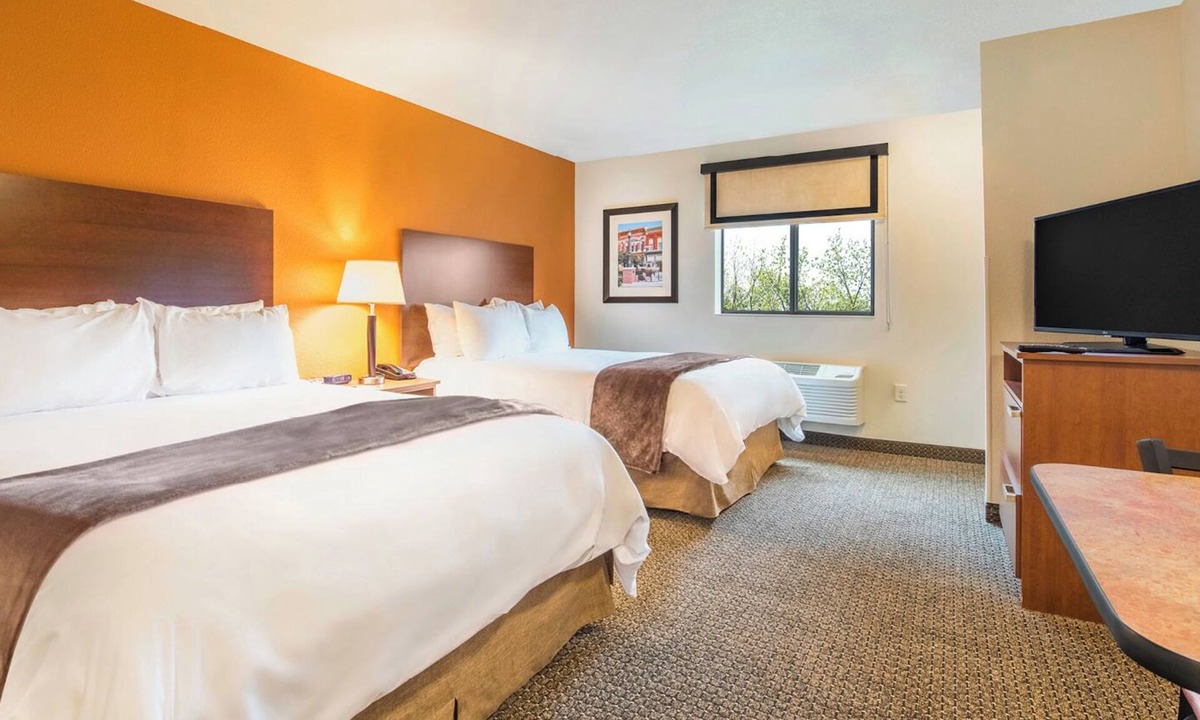 Lubbock Hotel | Relax in a 2 Queen Bed w/Kitchen Perfect for Families Near American Windmill
