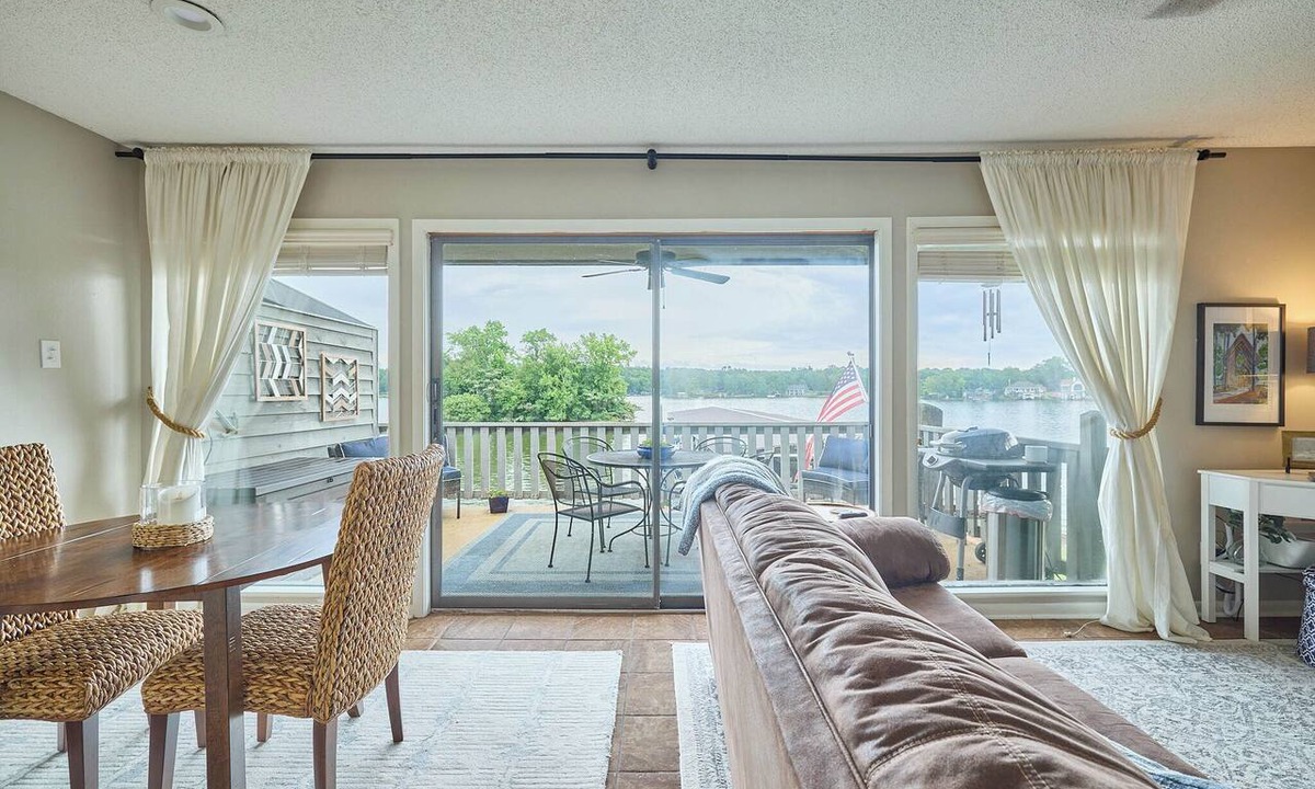 Hot Springs Condo | Relax sitting on your private balcony with views of Lake Hamilton.