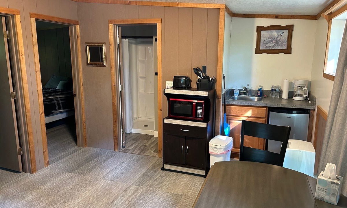 Sand Creek Cottage | Rustic cabins in secluded campground with lake access and woods to wander in.