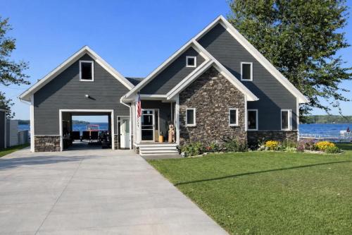 Curtis House | Snowmobile South Manistique Lake Lakeside Luxury