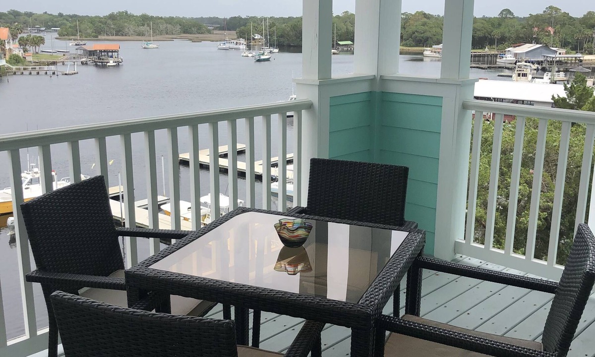 Steinhatchee Condo | Stunning Top Floor Views of The Steinhatchee River with Private Boat Slip/Pool!