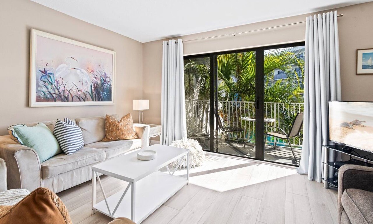 Avon By The Sea Condo | Sunny Condo w/Private Balcony, Heated Pool, and Steps to Beach Access & Pier! ☀️🏖️