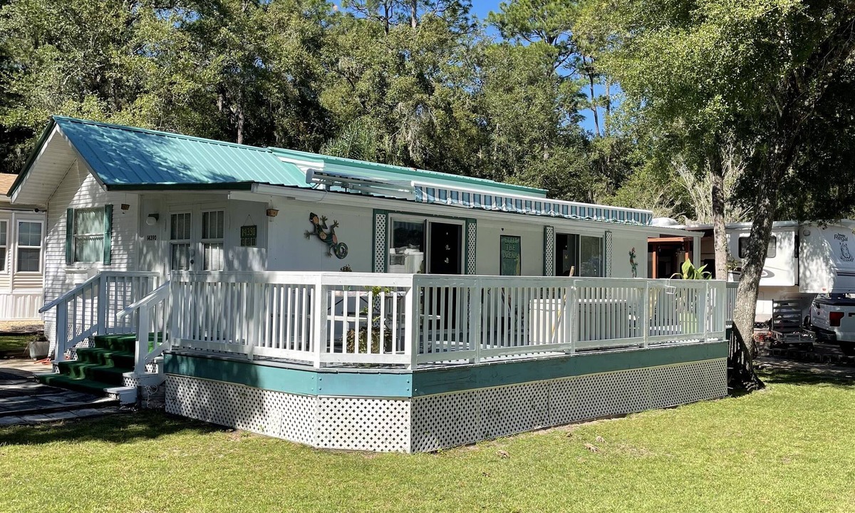 Fort McCoy RV Rental | Super roomy Park Model in premier resort with lake, pools, dock and boat launch.