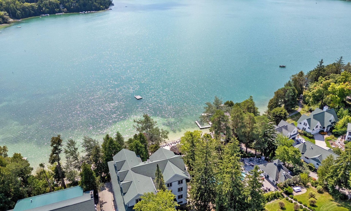 Elkhart Lake Condo | Waterfront Condo, Private Beach, Outdoor Pool & Hot Tub & Walkable to Downtown