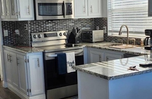 Hutchinson Island South House | 2- bedroom getaway walking distance to shops, restaurants, beaches and more.