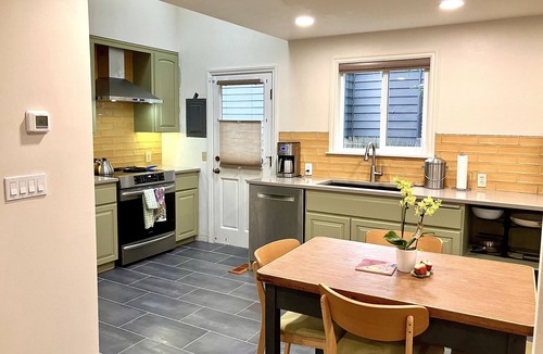 Bitter Lake House | 2 bedroom peaceful home with large backyard and modern amenities!