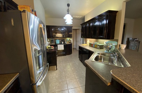 South Oklahoma City House | 2 King Beds on 19th st, Jacuzzi, Fireplace, Hulu/Netflix/Cable, and much more!