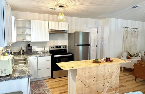 Ocean Springs House | 2BR/2BA secluded spot near water with fenced yard - Under the Oaks