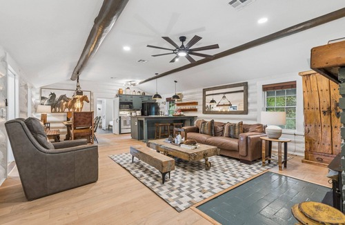 Central Oklahoma City Cabin | 3BR log cabin west OKC — fenced yard, grill, patio. Full kitchen. Sleeps 10. #MW