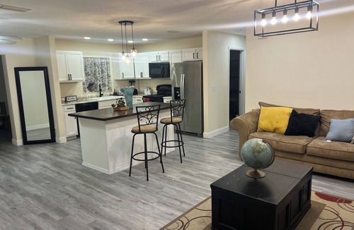 Palm Bay House | 4 bedroom 2 bath Modern Stay near Space Coast + Cozy Patio