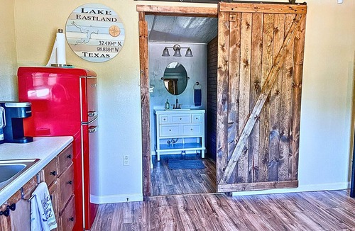 Eastland Cabin | 4 Lakefront Tiny Home | Small Family Glamping Getaway at Lake Eastland