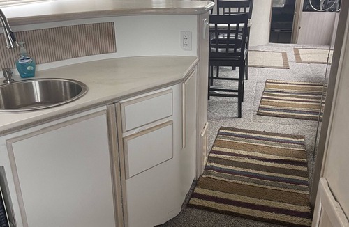 Anchor Bay Harbor Boat Rental | 50ft Stationary House Boat with Upper Sun Deck