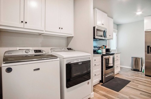 Central Oklahoma City House | 5BR Bethany home near Wiley Post & SNU. Hot tub, full kitchen. Sleeps 12. #COL