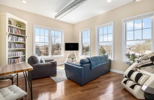 Milford Condo | Airy Penthouse Loft on Main St. w/Massage Chair