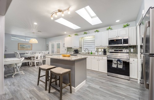 North River Shores House | Arcade Game Room · Firepit Patio · Kids Bunkroom
