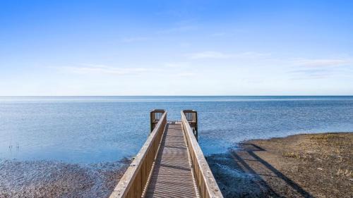 Port St. Joe House | Bayfront 4BR Home with Sunset Decks, Putting Green & Bonus Game Room
