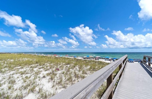 Sugar Beach House | Beachfront townhome with on-site beach access heated pool patio grill AC WD