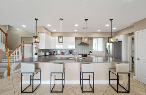 Cocoa Beach Villa | Beachfront Villa with Heated Pool Mini Golf Fire Pit and SpaceX Views