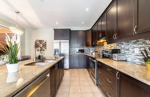 Milton House | Beautiful 4 BR Home. Backyard Oasis. Chefs Kitchen