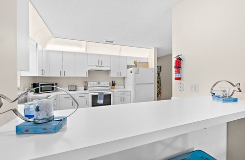 Indialantic House | Blissful Townhome - HEATED POOL - Walk to the Beach - Dog Friendly