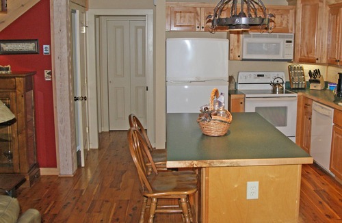 Seven Devils Cabin | Book your Fall Getaway! Firepit. Pond view. Wood burning fireplace.
