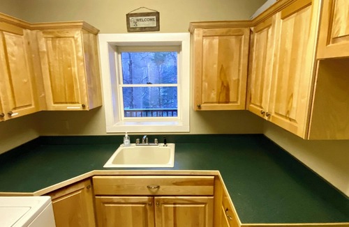 Seven Devils Cabin | Book your Fall Getaway! Firepit. Pond view. Wood burning fireplace.