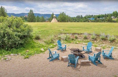 Hot Springs RV Rental | Buffalo Glamping Tipi with King Bed in Black Hills