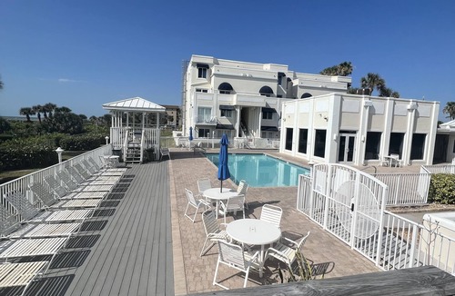 Chandler Park Condo | Cape Canaveral Oceanside Oasis - 1st floor with bikes and beach toys