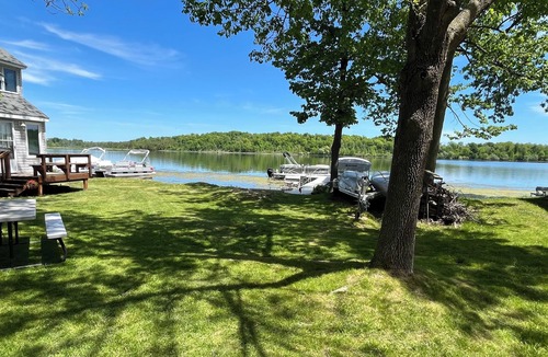 Campbellsport Cottage | Charming 2-bedroom cottage on Long Lake Dundee. WI Property right on the water
