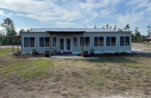 Perry House | Charming 3-bedroom 2 bath home with WiFi, games,& full gym. 1.5 miles from ramp.