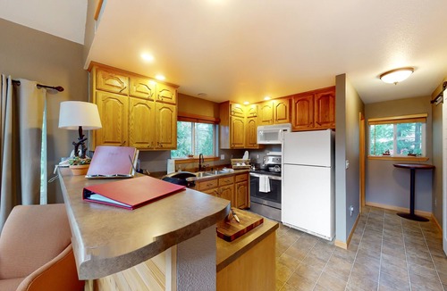 Beckwourth House | Charming cabin with private deck, fireplace, movie projector, & W/D