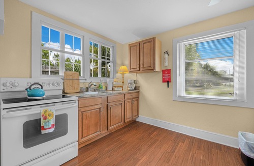Polk City Cottage | Charming Historic Cottage with Cozy Porch and Garden Retreat